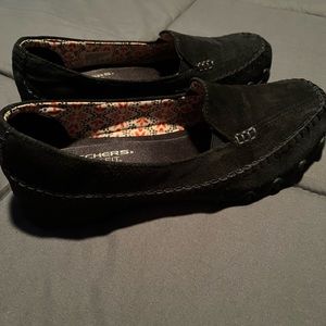 Women’s black Skechers slip ons.  Excellent condition